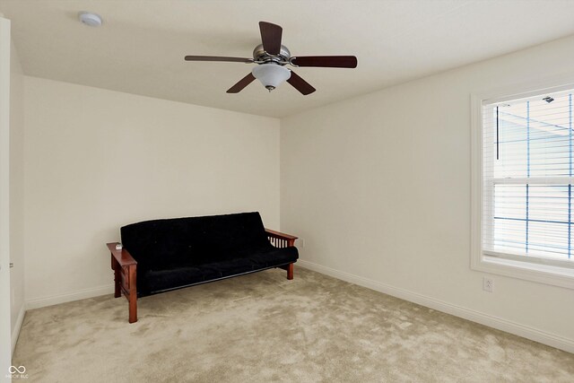 6869 W Winding, Mccordsville, IN 46055 - living area featuring carpet floors, baseboards, and a healthy amount of sunlight