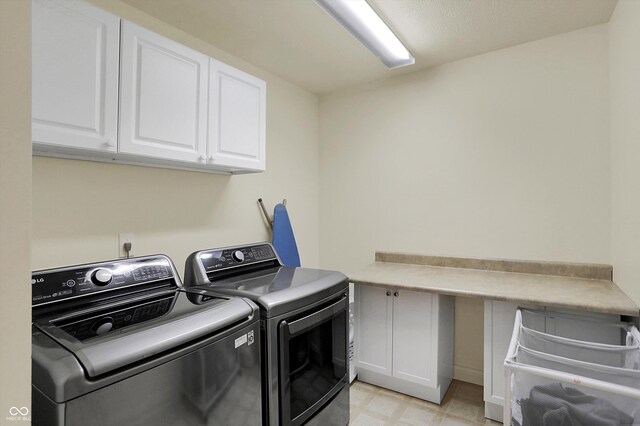 6869 W Winding, Mccordsville, IN 46055 - laundry area featuring cabinet space, washing machine and dryer, and light floors