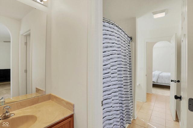 6869 W Winding, Mccordsville, IN 46055 - bathroom featuring tile patterned floors, vanity, curtained shower, and ensuite bathroom