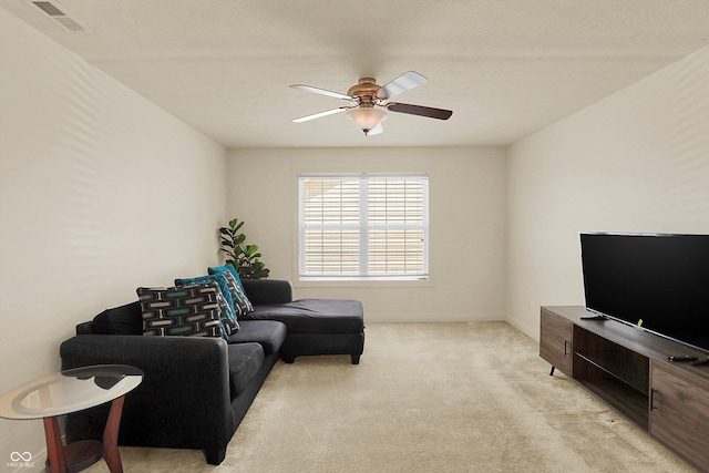 6869 W Winding, Mccordsville, IN 46055 - living area featuring light carpet, ceiling fan, baseboards, and visible vents
