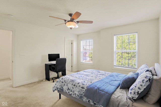 6869 W Winding, Mccordsville, IN 46055 - bedroom with baseboards, a ceiling fan, and carpet flooring