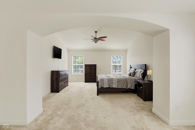 6869 W Winding, Mccordsville, IN 46055 - bedroom with baseboards, ceiling fan, light colored carpet, and vaulted ceiling