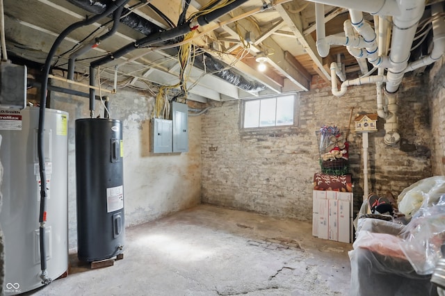 below grade area featuring water heater and electric panel