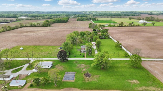 birds eye view of property with a rural view