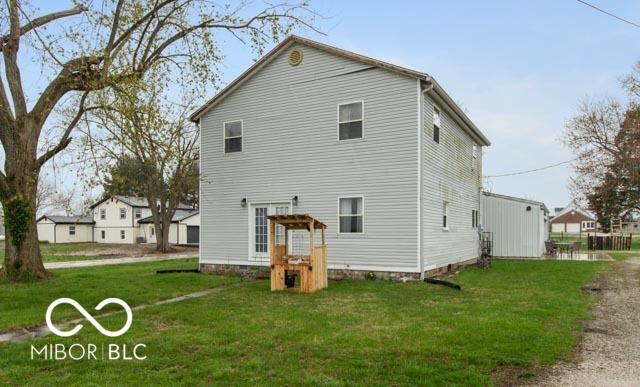 5973 Masten Rd, Coatesville, IN 46121 - rear view of property with a lawn