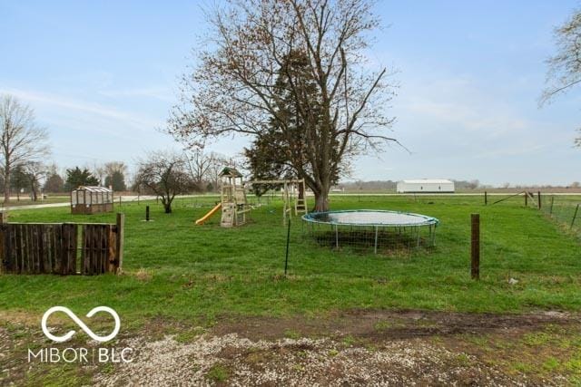 5973 Masten Rd, Coatesville, IN 46121 - view of yard featuring fence and a playground