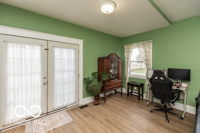 5973 Masten Rd, Coatesville, IN 46121 - office space with visible vents, french doors, baseboards, and wood finished floors