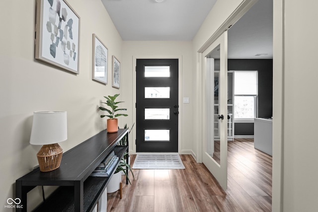 1024 Cyprian Way, Lebanon, IN 46052 - foyer entrance featuring wood finished floors, french doors, and baseboards