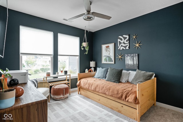 1024 Cyprian Way, Lebanon, IN 46052 - living area with carpet, a ceiling fan, and baseboards