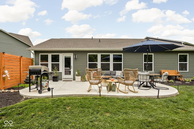 1024 Cyprian Way, Lebanon, IN 46052 - rear view of house featuring a shingled roof, a patio, and an outdoor hangout area