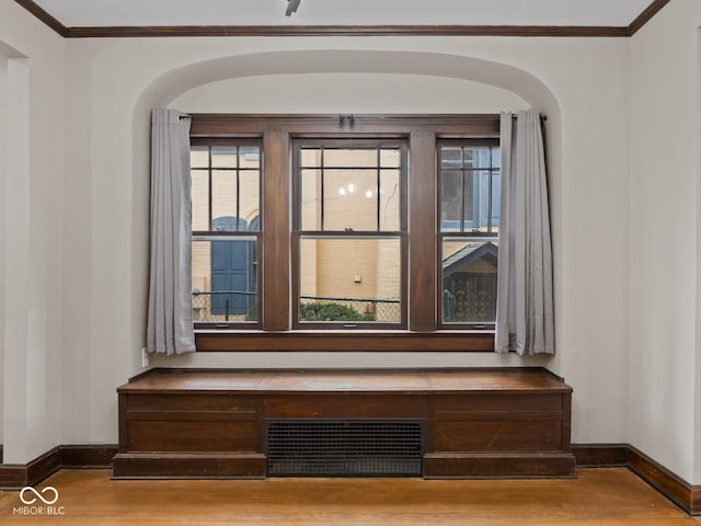 270 W Broadway St, Shelbyville, IN 46176 - interior details with wood finished floors, ornamental molding, baseboards, and visible vents