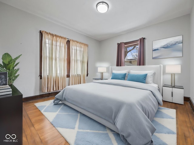 270 W Broadway St, Shelbyville, IN 46176 - bedroom featuring baseboards and wood finished floors