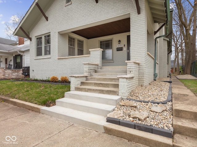 270 W Broadway St, Shelbyville, IN 46176 - view of front of property with brick siding and a porch