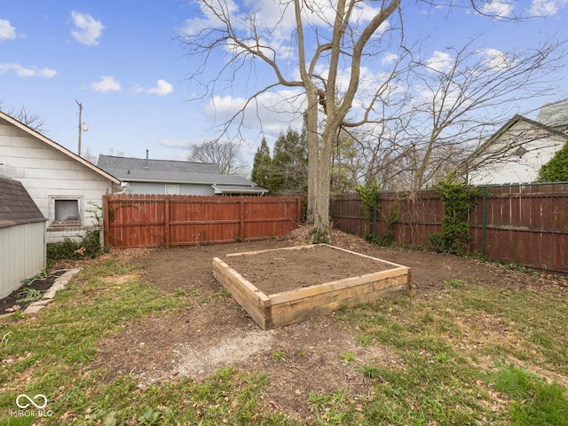 270 W Broadway St, Shelbyville, IN 46176 - view of yard featuring a fenced backyard and a garden