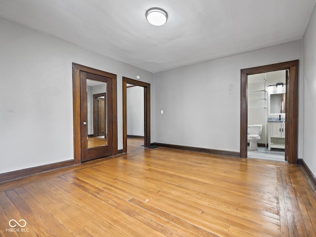 270 W Broadway St, Shelbyville, IN 46176 - empty room with baseboards and light wood-style flooring