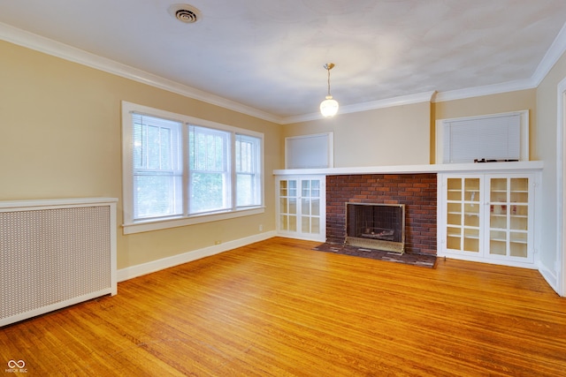 3619 Salem St, Indianapolis, IN 46208 - unfurnished living room featuring baseboards, visible vents, crown molding, and wood finished floors