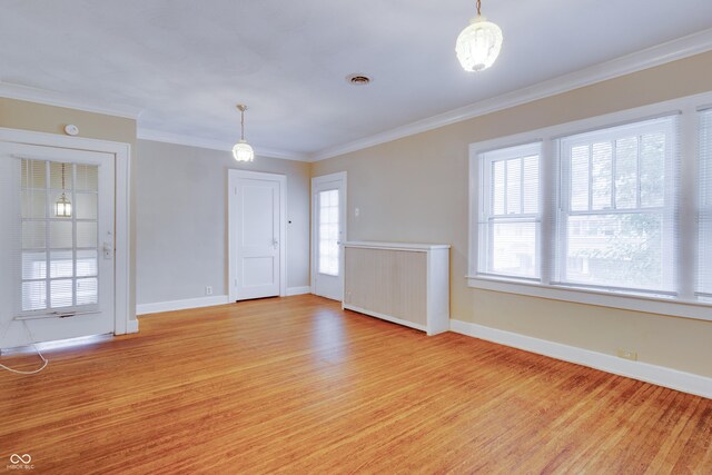 3619 Salem St, Indianapolis, IN 46208 - interior space with baseboards, ornamental molding, visible vents, and light wood finished floors