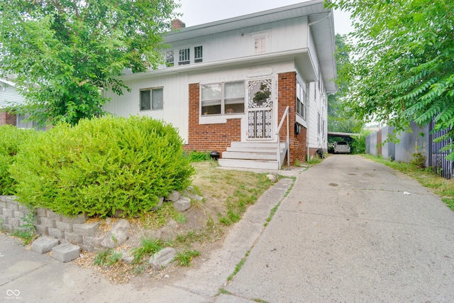 3619 Salem St, Indianapolis, IN 46208 - view of front of home featuring brick siding and fence