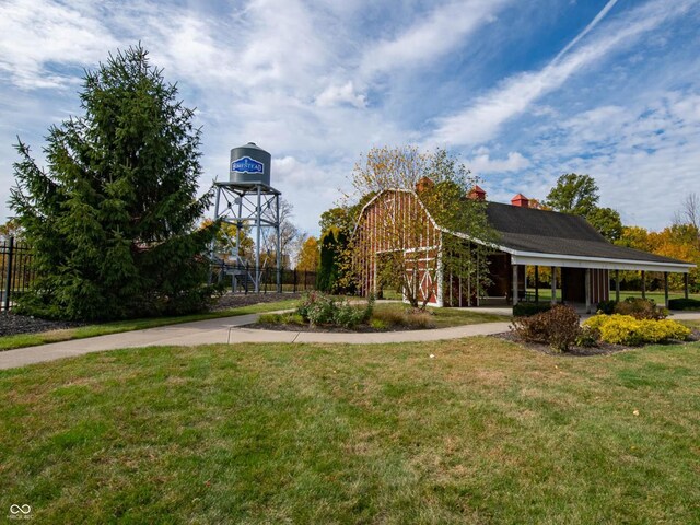 3241 W Keepsake Ln, Monrovia, IN 46157 - view of home's community with a lawn, an outbuilding, fence, and a barn