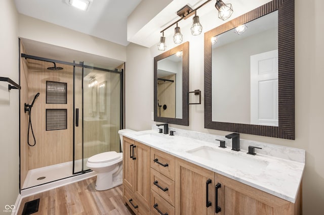 bathroom featuring a sink, visible vents, and a stall shower