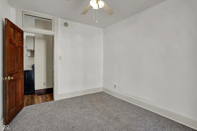 1157 Division St, Noblesville, IN 46060 - empty room featuring dark carpet and a ceiling fan