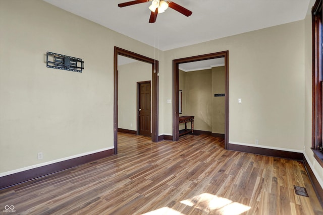 1157 Division St, Noblesville, IN 46060 - empty room featuring a ceiling fan and wood finished floors