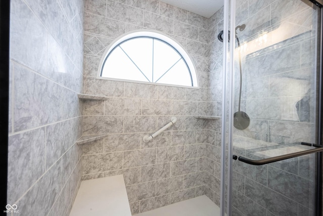 full bathroom with a shower stall