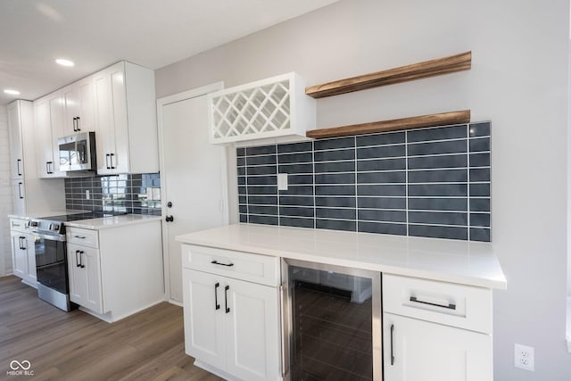 kitchen featuring tasteful backsplash, open shelves, light wood-style floors, stainless steel appliances, and beverage cooler