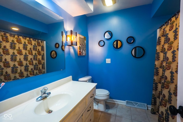 full bath with vanity, toilet, baseboards, tile patterned floors, and visible vents