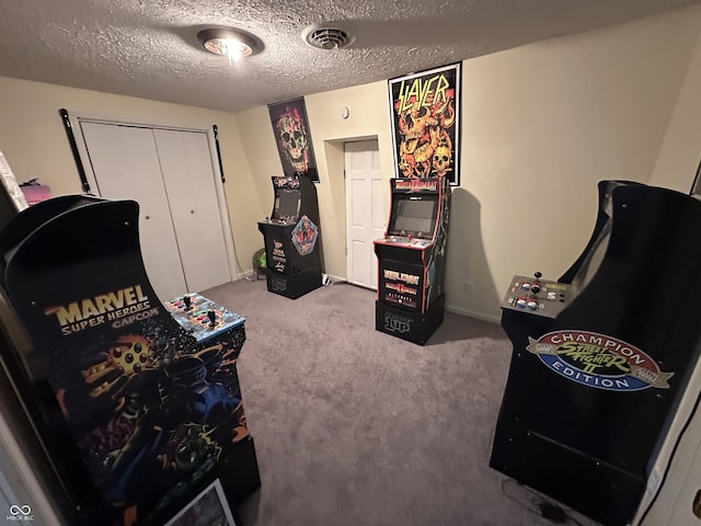 carpeted bedroom featuring a textured ceiling, visible vents, and a closet