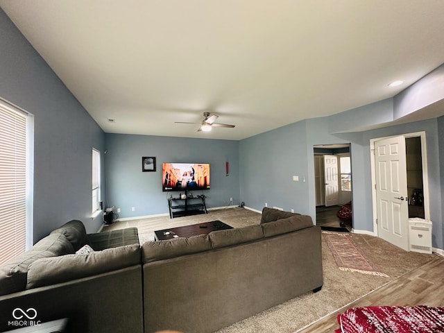 1071 Hazelwood Dr, Greenwood, IN 46143 - living room with baseboards, wood finished floors, and ceiling fan
