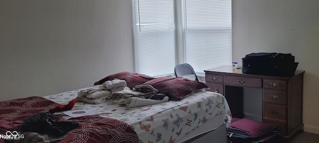 bedroom with a textured wall