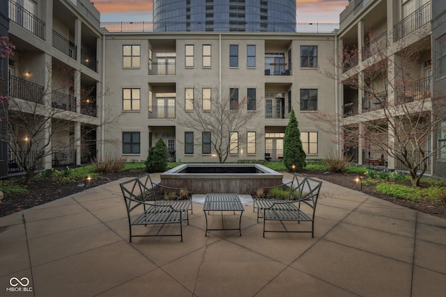 view of community with a patio