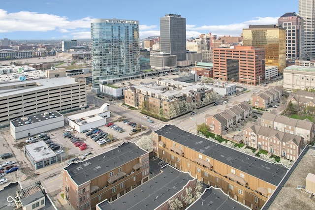 birds eye view of property with a city view