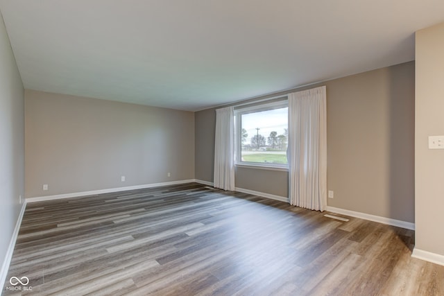 2205 Lafayette Rd, Crawfordsville, IN 47933 - spare room with baseboards and wood finished floors