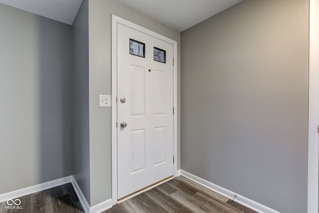 2205 Lafayette Rd, Crawfordsville, IN 47933 - entryway featuring dark wood-type flooring and baseboards