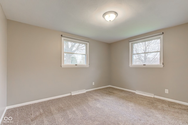 2205 Lafayette Rd, Crawfordsville, IN 47933 - carpeted spare room with visible vents and baseboards