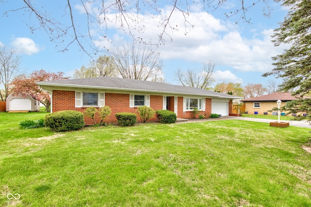 2205 Lafayette Rd, Crawfordsville, IN 47933 - single story home featuring an attached garage, a front lawn, driveway, and brick siding