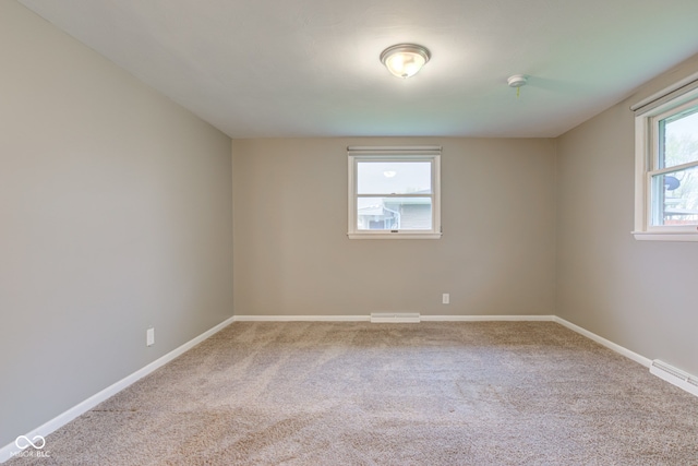 2205 Lafayette Rd, Crawfordsville, IN 47933 - carpeted spare room featuring visible vents and baseboards