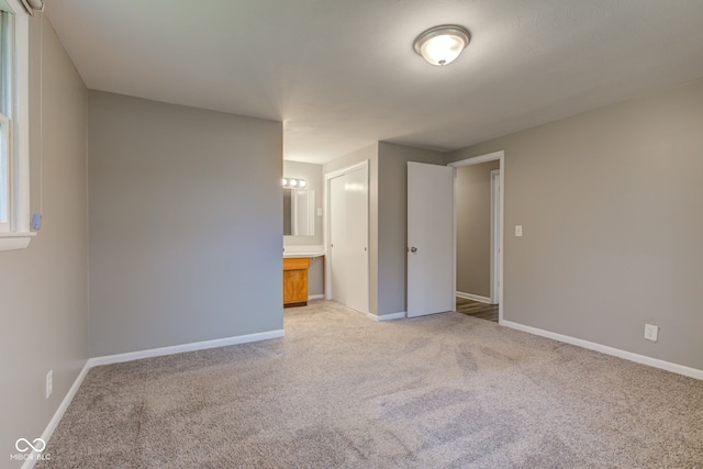 2205 Lafayette Rd, Crawfordsville, IN 47933 - spare room featuring baseboards and light carpet
