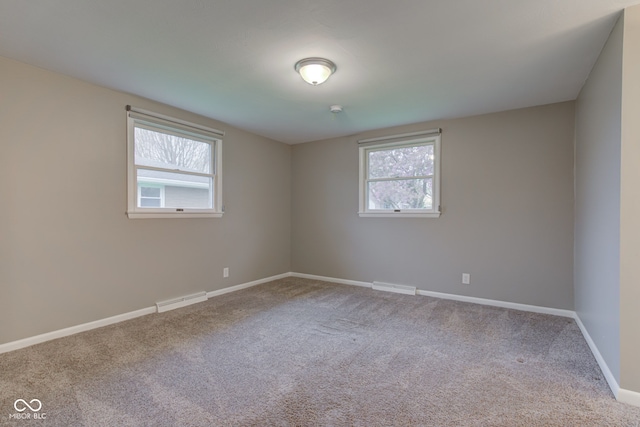 2205 Lafayette Rd, Crawfordsville, IN 47933 - carpeted spare room featuring visible vents and baseboards