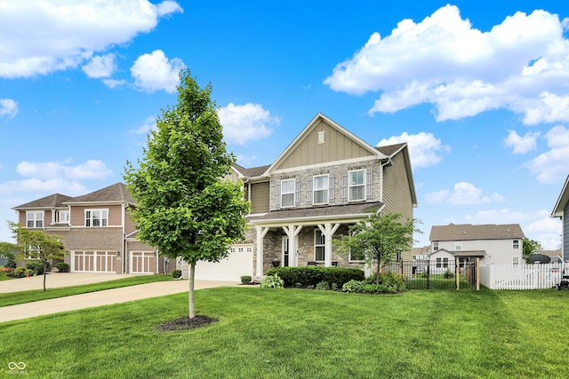 16491 Wheatley Ct, Fishers, IN 46040 - craftsman-style home with stone siding, board and batten siding, driveway, and an attached garage