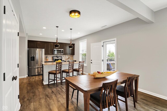 16491 Wheatley Ct, Fishers, IN 46040 - dining room featuring dark wood-type flooring, baseboards, and recessed lighting