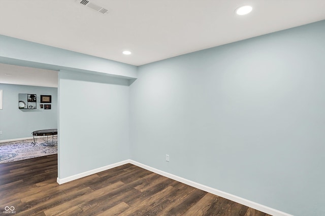 16491 Wheatley Ct, Fishers, IN 46040 - spare room featuring dark wood-style flooring, baseboards, and recessed lighting