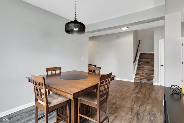 16491 Wheatley Ct, Fishers, IN 46040 - dining room featuring stairway, dark wood-type flooring, and baseboards