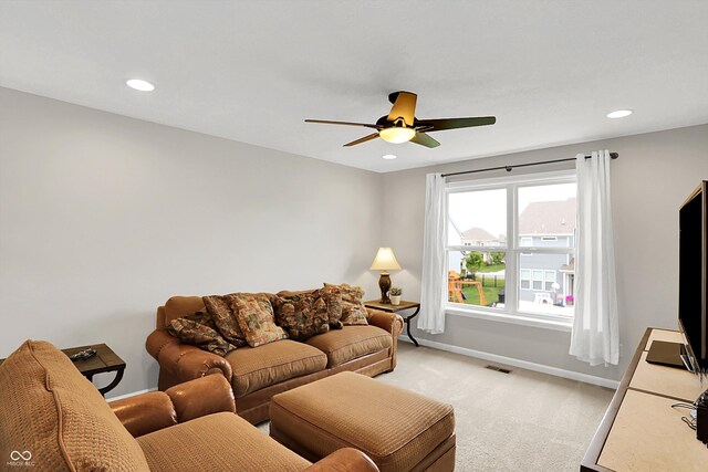 16491 Wheatley Ct, Fishers, IN 46040 - living area featuring light carpet, baseboards, a ceiling fan, and recessed lighting