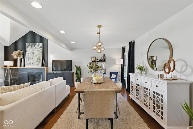 living area with recessed lighting and dark wood-type flooring