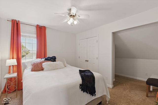 bedroom with a closet, carpet flooring, baseboards, and a ceiling fan