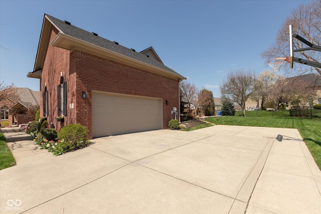 view of property exterior with a lawn, driveway, roof with shingles, and brick siding