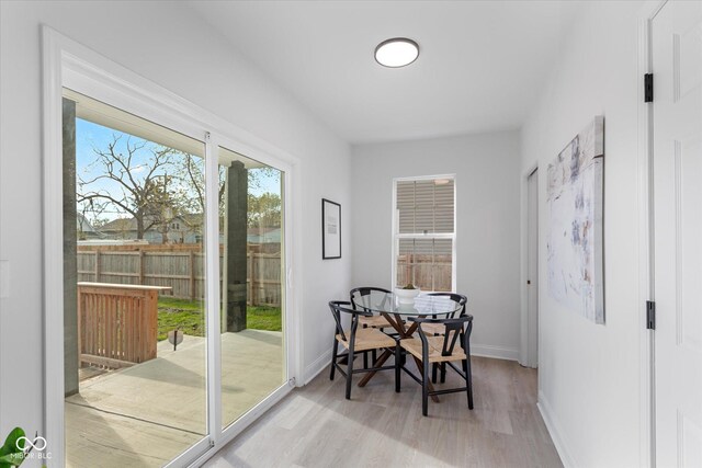 625 N Parker Ave, Indianapolis, IN 46201 - dining room featuring light wood-style floors and baseboards